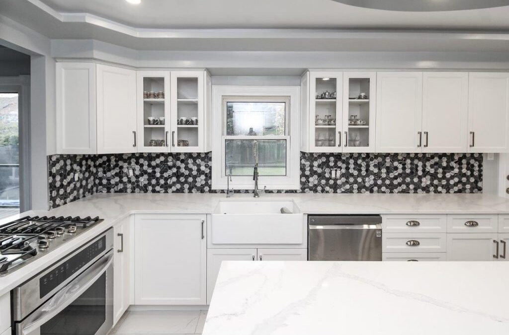 Accenting hex tile backsplash and white farmhouse sink
