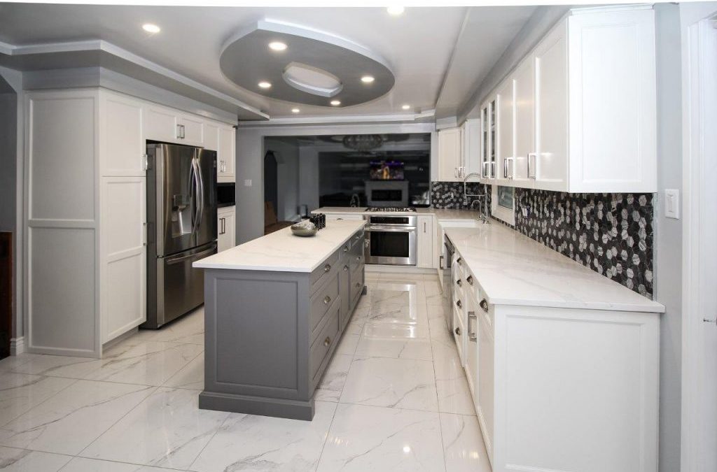 White neo-traditional kitchen with grey island and accents