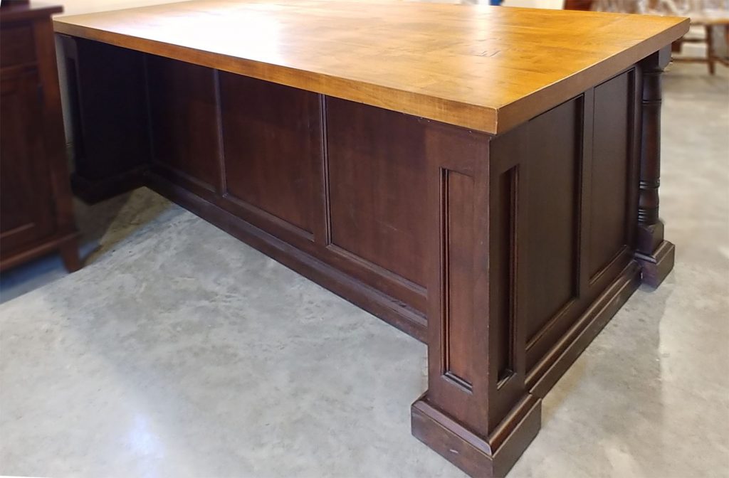 Traditional four post desk with wormy maple top