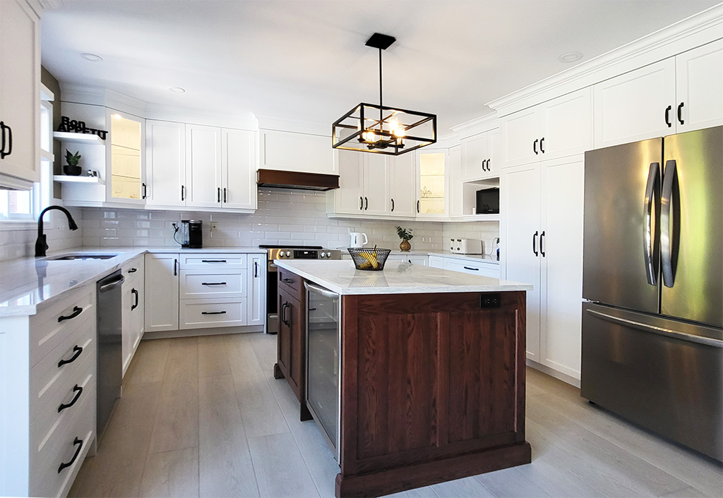White U-shaped kitchen with dark red oak island and white countertops and backsplash